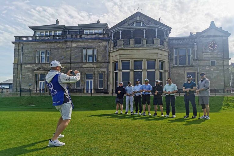 Travelers playing golf in Scotland