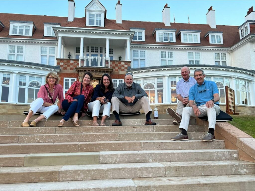 Group Captain Rob Sandlin and Friends from San Jose Country Club enjoy a toast on the steps at Turnberry.