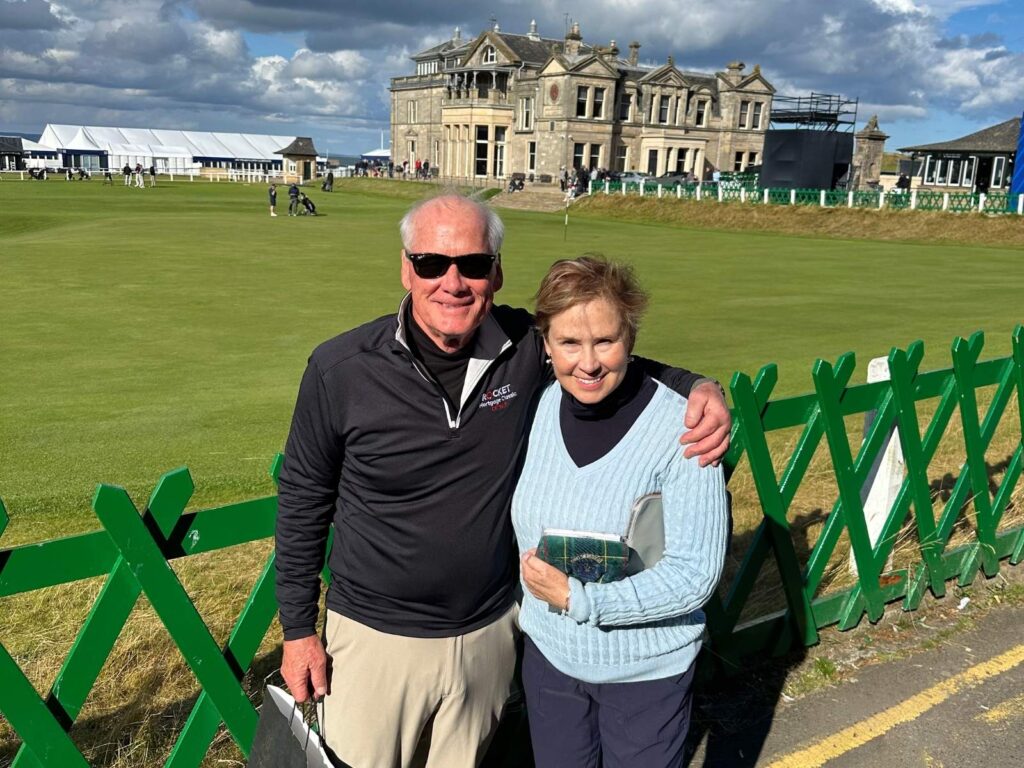 Russ Ethridge and Peggy Koblenzer from Camp Creek Golf Club and Portage Golf Club soak up the sun in St. Andrews.