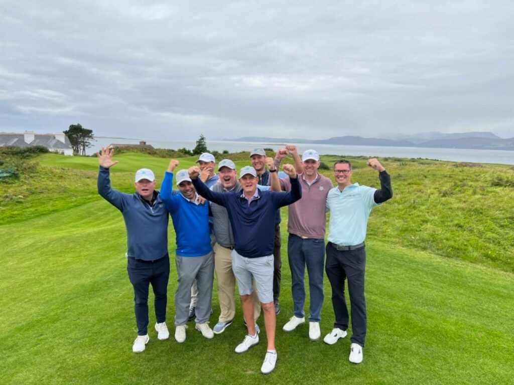 Group Captain Sean Lynch and Friends celebrate a great day at Dooks Golf Links.