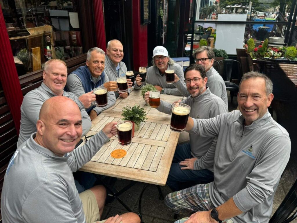 The Expedition led by Bill Stiles toasts decades of friendship and several 60th birthdays at The Criterion in St. Andrews.