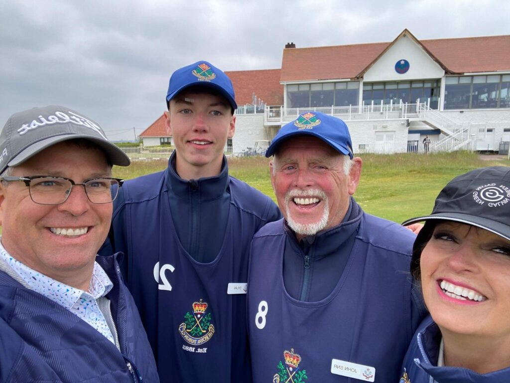 Carl & Vicki Lamb from St. Clair Country Club with their caddies at Royal Dublin.