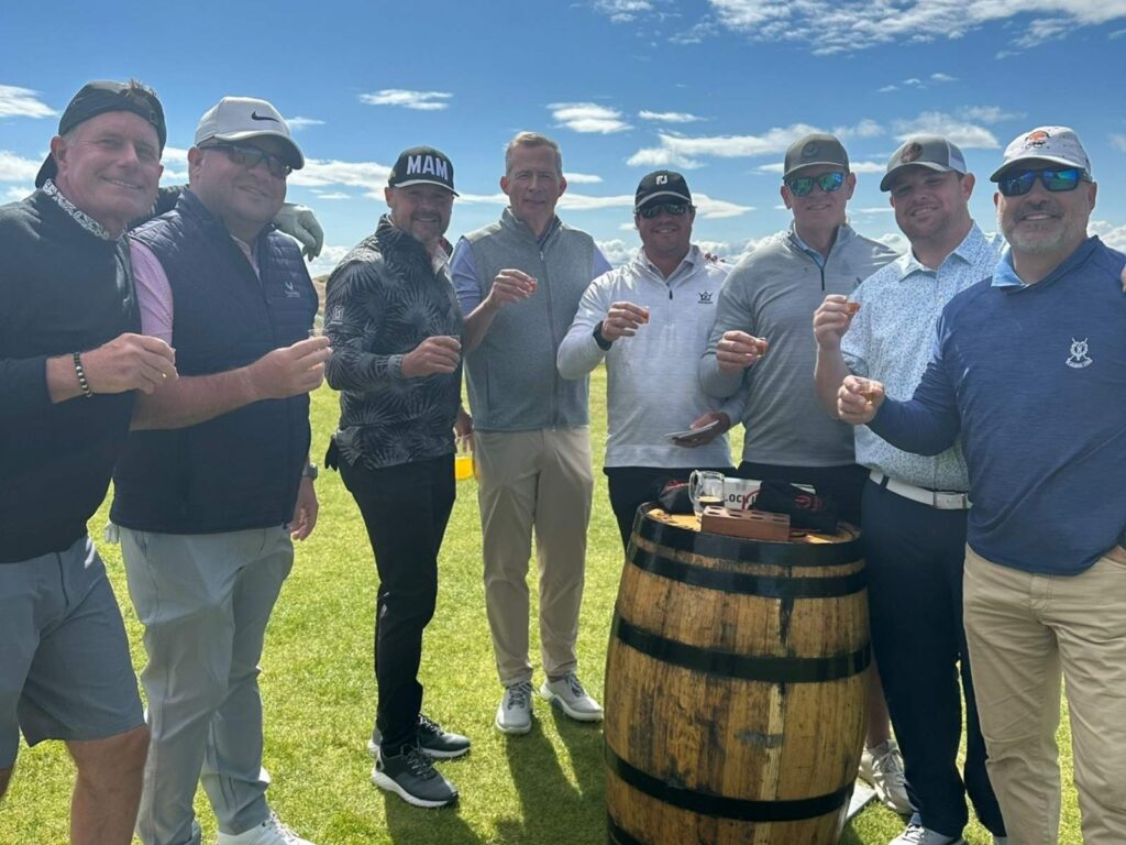 Group Captain Greg Couch and Friends from Valhalla Golf Club enjoy a welcome dram at Dumbarnie Golf Links