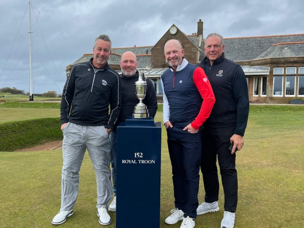 The Expedition led by Brian Garcea from Medinah Country Club with the Claret Jug at Royal Troon.
