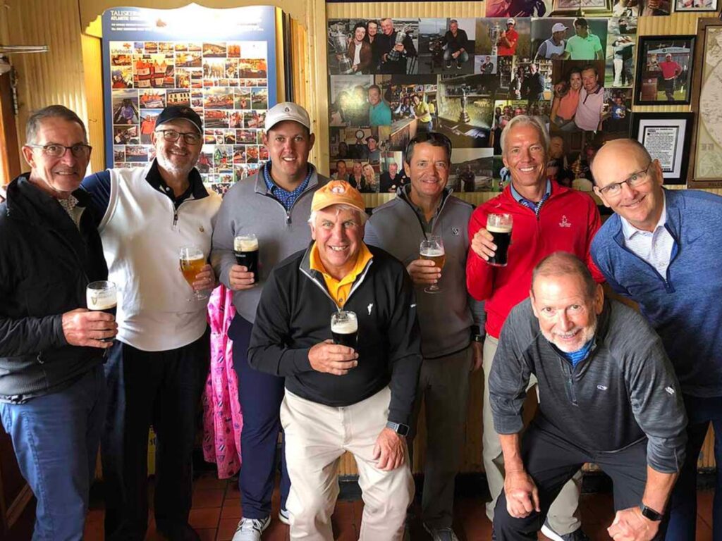 Nick Haudek, PGA and his Evansville Country Club members raise a glass at The Harbour Bar in Portrush
