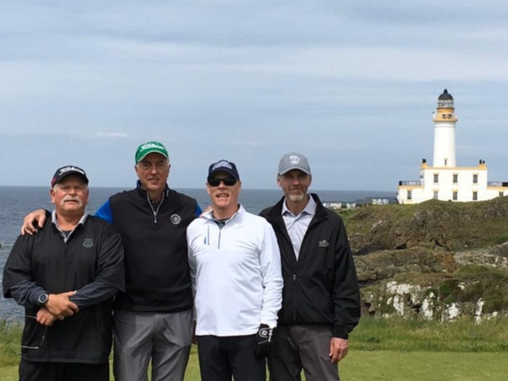 Group Captain Mike Hartley with Friends on the fabulous 9th at Turnberry