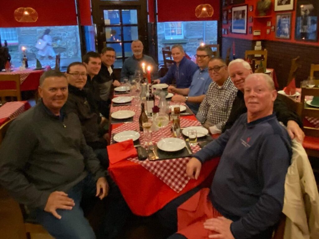 Group Captain Alex Romanoff and Friends enjoy a post-round dinner at Little Italy in St. Andrews