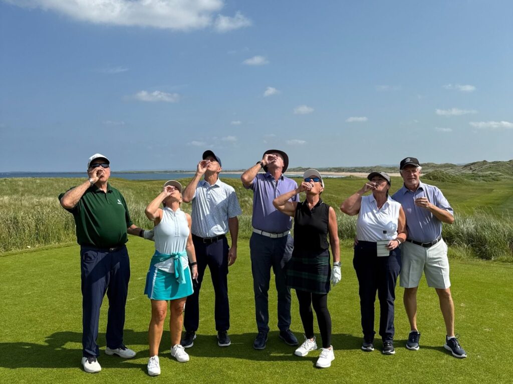 The Expedition led by Pegeen Link from Meadowbrook Country Club and Quail Valley Golf Club toast the start of their round at Doonbeg.