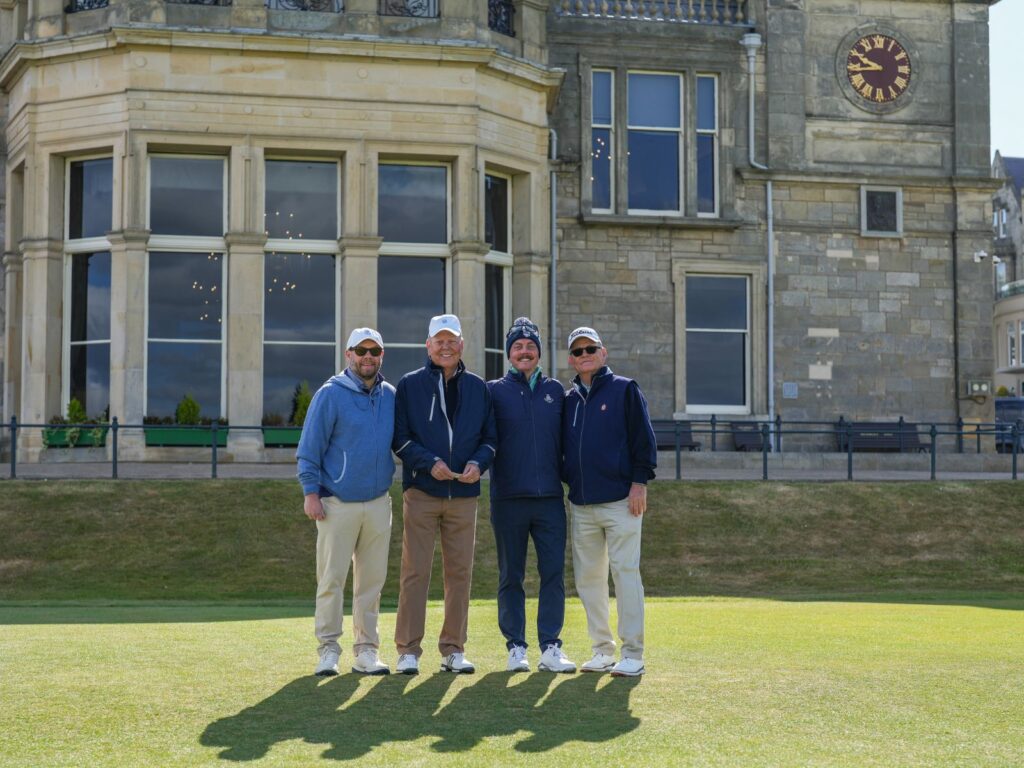 Group Captain Rick Meskell and Family on the 1st tee of The Old Course.