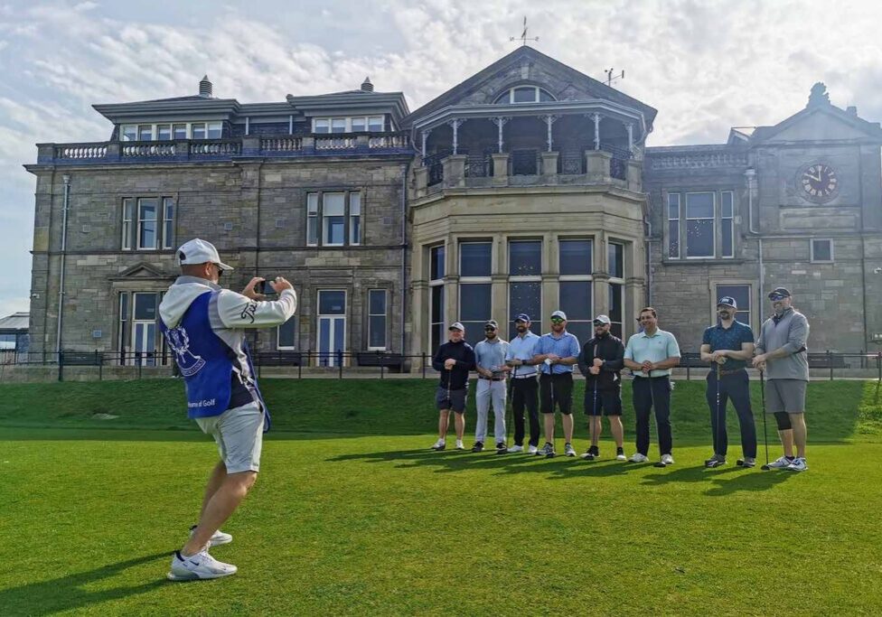 Travelers playing golf in Scotland