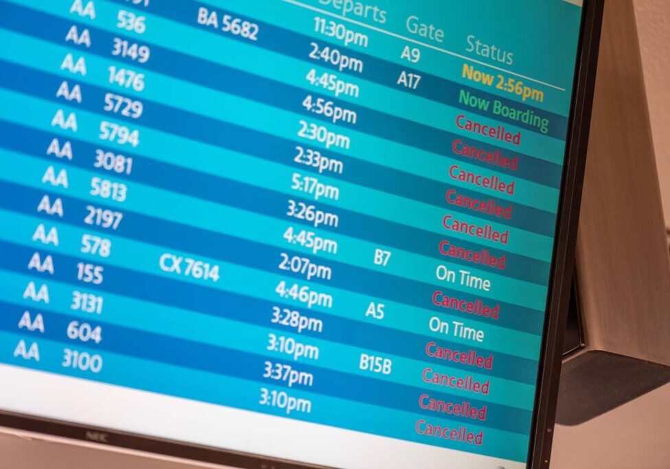 Airport board with canceled flights for a golf trip
