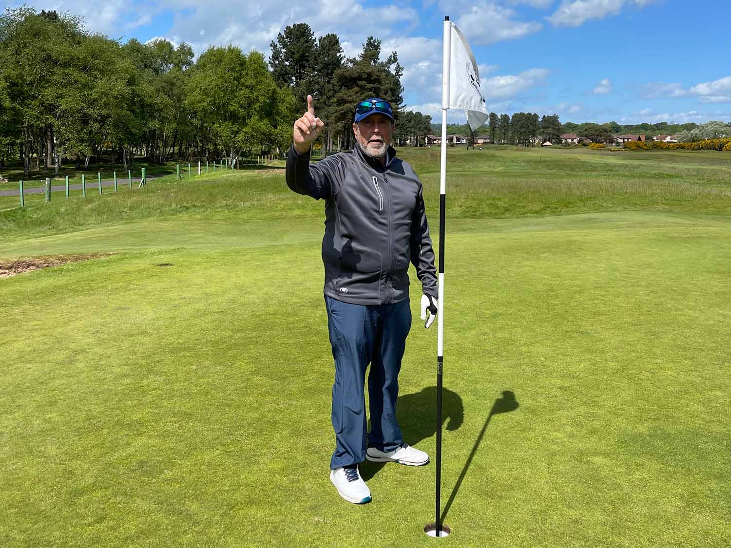 Golfer celebrates hole in one at Carnoustie